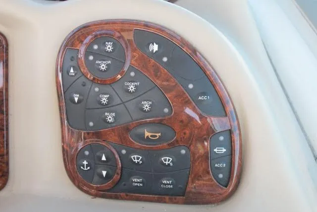 Slide: The Image of Control panel of a 2007 Sea Ray 340 Sundancer boat with wood finish. - 37
