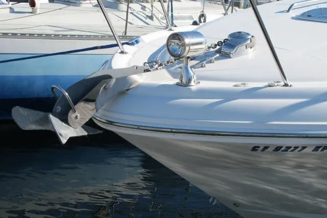 Slide: The Image of 2007 Sea Ray 340 Sundancer boat with anchor, docked in marina. - 40