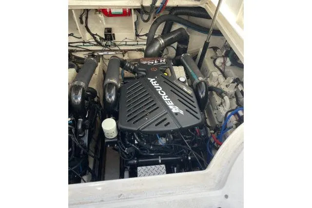 Slide: The Image of Engine compartment of 2007 Sea Ray 340 Sundancer with Mercury engine. - 41