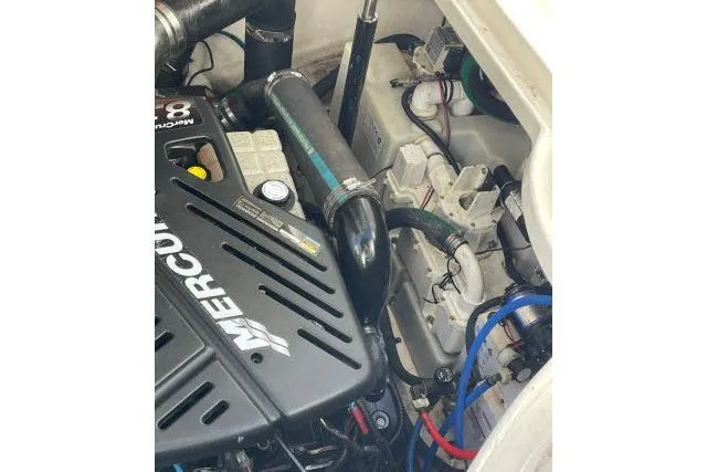 Slide: The Image of Engine compartment of 2007 Sea Ray 340 Sundancer with MerCruiser components visible. - 44