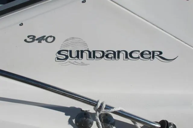Slide: The Image of 2007 Sea Ray 340 Sundancer boat nameplate with logo and railing. - 46