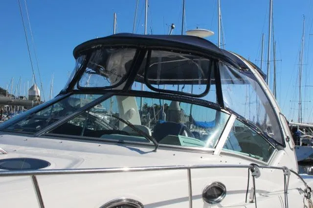 Slide: The Image of 2007 Sea Ray 340 Sundancer yacht docked at marina under clear blue sky. - 47