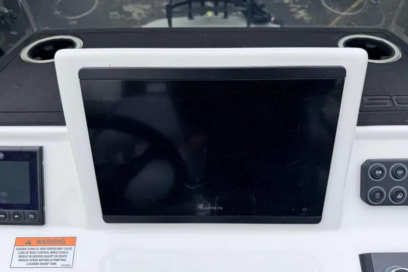 Slide: The Image of 2026 SCB R24 dashboard featuring Garmin display and control panel. - 10