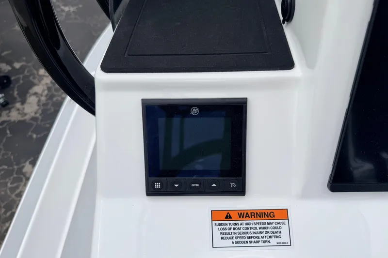 Slide: The Image of 2026 SCB R24 dashboard with digital display and warning label. - 11