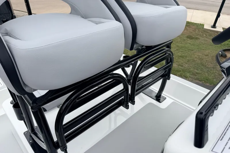 Slide: The Image of 2026 SCB R24 boat seats with sleek black frame and light gray cushions. - 17