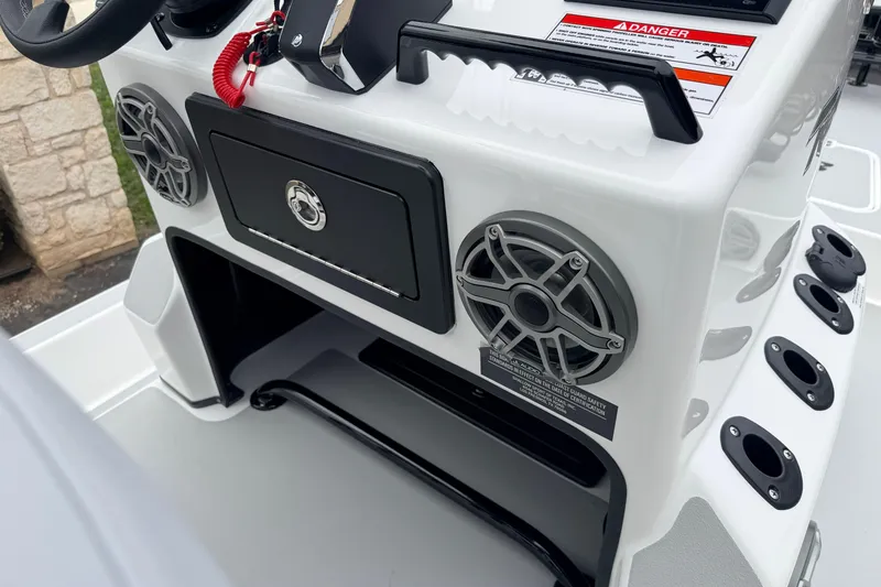 Slide: The Image of 2026 SCB R24 boat console with speakers, storage, and rod holders. - 18