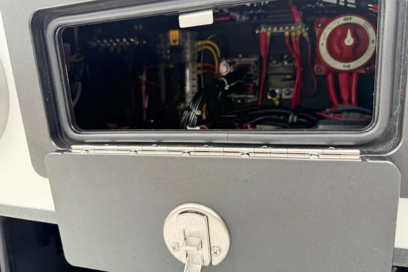 Slide: The Image of Electrical compartment of 2026 SCB R24 with wiring and control switch. - 19