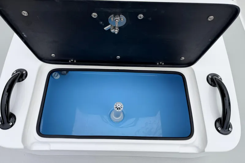 Slide: The Image of Open compartment of SCB R24 2026 model with blue interior and black handles. - 23