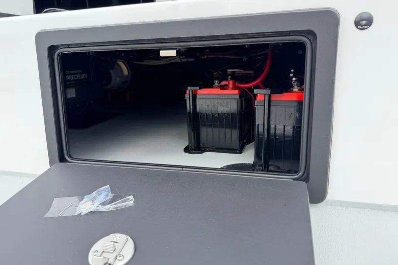Slide: The Image of Battery compartment of 2026 SCB R24 with visible red and black connections. - 29