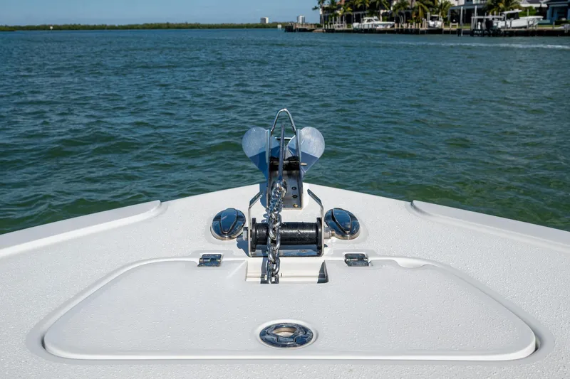 Slide: The Image of Bow view of 2018 Yellowfin 36 Offshore boat on calm water. - 21