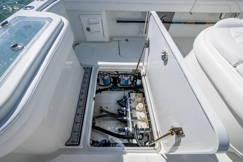 Slide: The Image of 2018 Yellowfin 36 Offshore boat showing open hatch with internal components. - 28