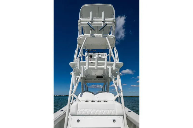 Slide: The Image of 2018 Yellowfin 36 Offshore boat with tower against clear blue sky. - 30