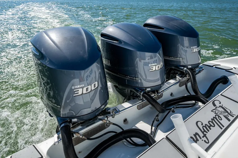 Slide: The Image of 2018 Yellowfin 36 Offshore boat with triple Yamaha 300 engines on the water. - 33