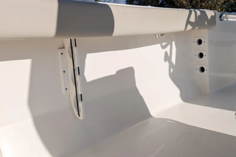 Slide: The Image of Interior view of 2022 Key West 189 FS boat, showcasing seating and storage features. - 10
