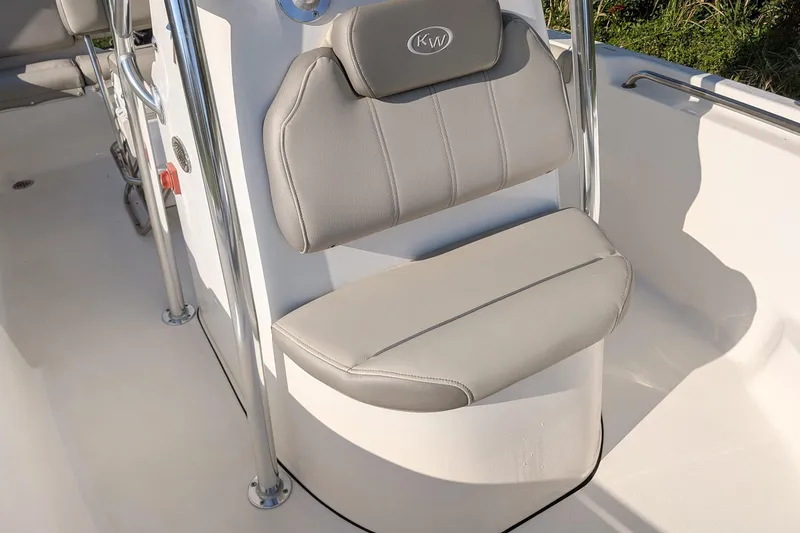 Slide: The Image of 2022 Key West 189 FS boat seat with gray upholstery and KW logo. - 9