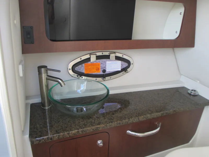 Slide: The Image of Yamaha tachometer on 2018 Crownline Eclipse E29 XS boat dashboard, showing 236.6 hours. - 24