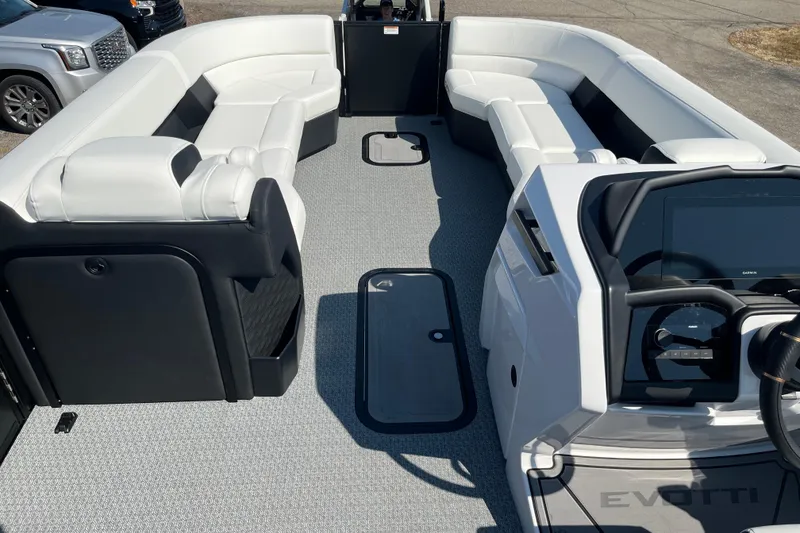 Slide: The Image of Luxurious 2026 Evotti 725CS boat interior with plush seating and modern dashboard. - 13