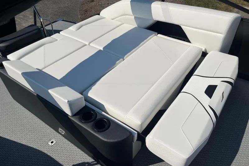 Slide: The Image of Luxurious white seating on 2026 Evotti 725CS boat, featuring cup holders and modern design. - 15