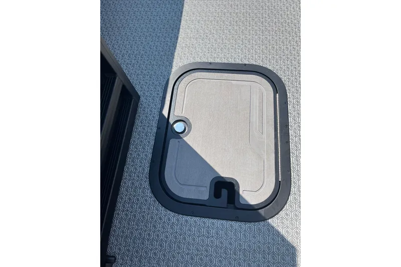 Slide: The Image of Hatch on Evotti 725CS boat deck, 2026 model, with textured flooring. - 3