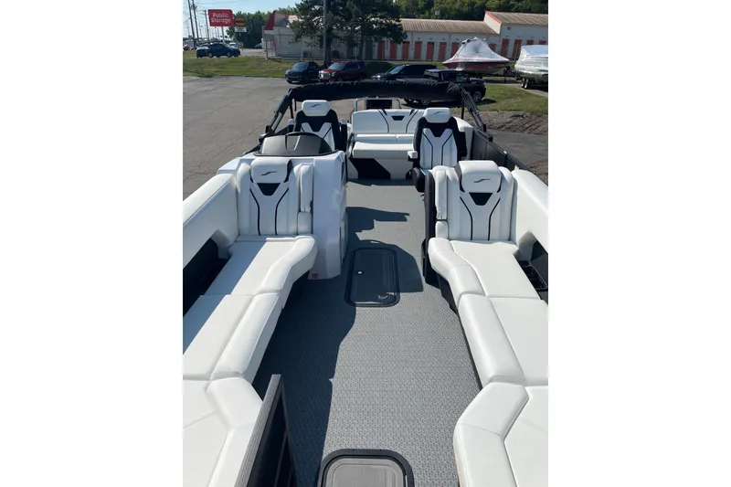 Slide: The Image of Luxurious 2026 Evotti 725CS boat interior with sleek white seating and modern design. - 7