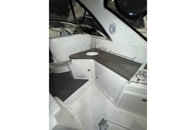 Slide: The Image of 2009 Regal Commodore 3760 IO dashboard with Raymarine navigation system. - 10