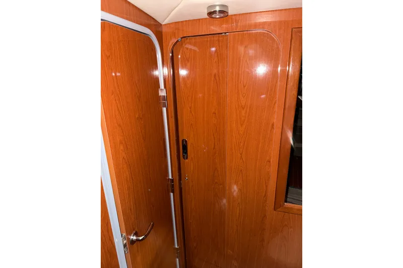 Slide: The Image of 2009 Regal Commodore 3760 IO boat bathroom with toilet and shower. - 19