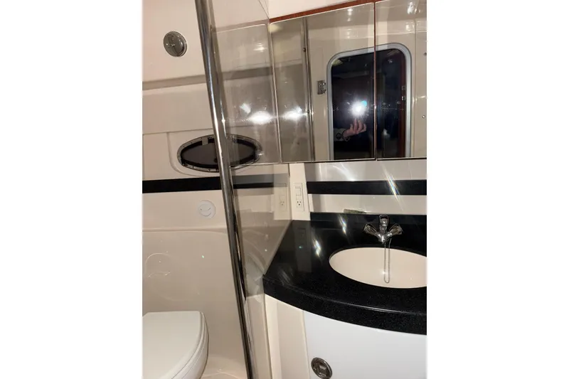 Slide: The Image of Engine compartment of 2009 Regal Commodore 3760 IO boat. - 24