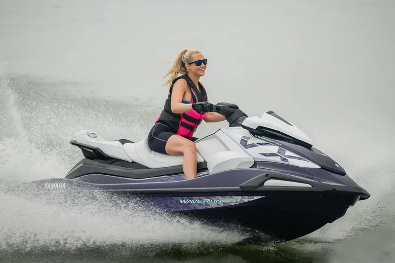 Slide: The Image of Manufacturer Provided Image: Woman riding 2026 Yamaha WaveRunner FX Cruiser SVHO on water, wearing a life vest and sunglasses. - 4