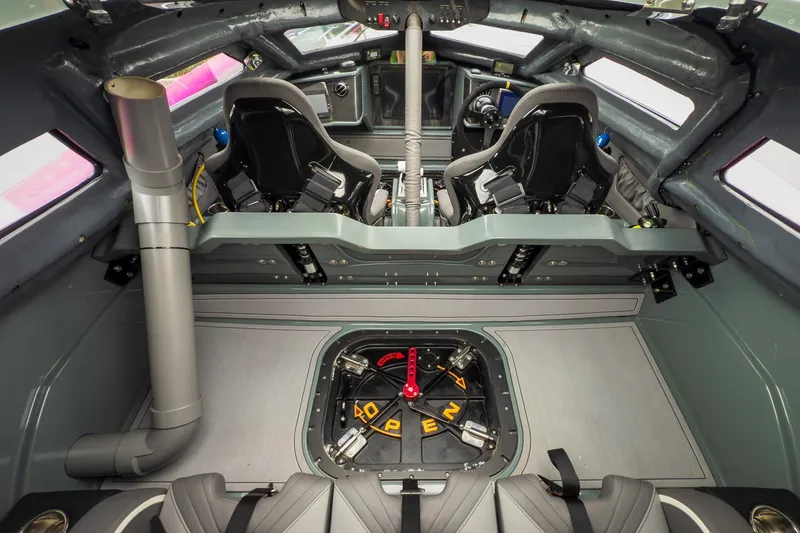 Slide: The Image of Interior of 2023 MTI 390XR boat, featuring advanced cockpit and seating design. - 59