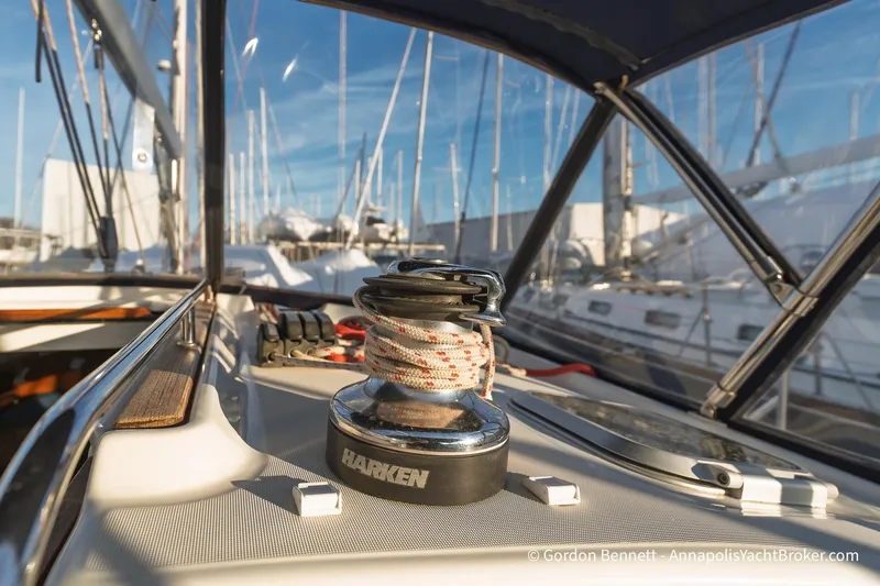 Slide: The Image of 2004 Jeanneau Sun Odyssey 43 DS sailboat deck with Harken winch in marina. - 13