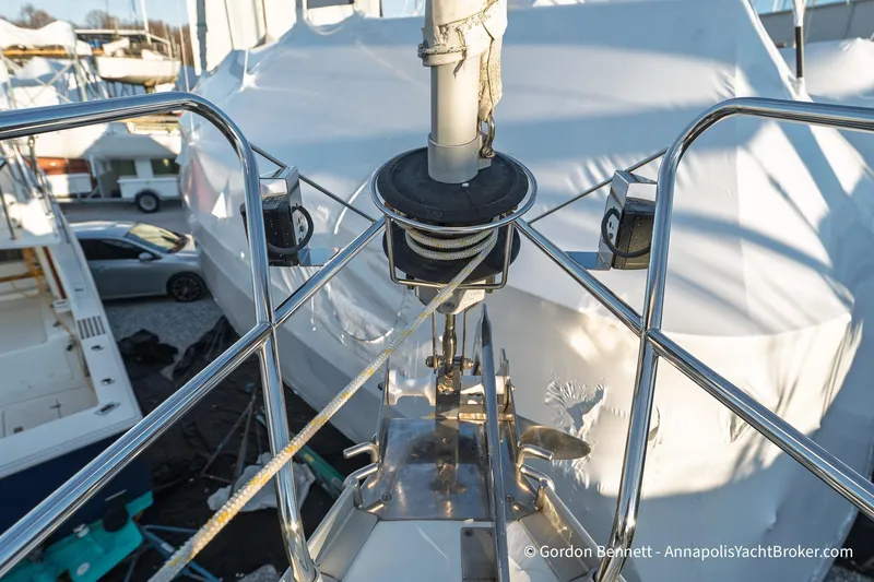 Slide: The Image of Bow view of 2004 Jeanneau Sun Odyssey 43 DS yacht in a marina. - 27