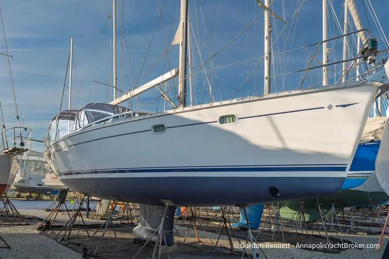 Slide: The Image of 2004 Jeanneau Sun Odyssey 43 DS sailboat on stands, ready for maintenance. - 5