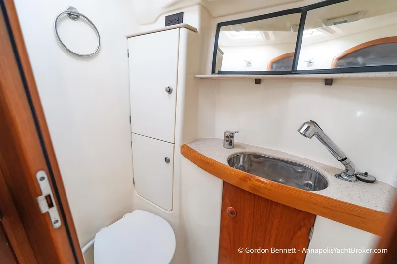 Slide: The Image of Bathroom of 2004 Jeanneau Sun Odyssey 43 DS yacht with sink and storage. - 50