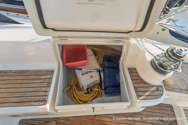 Slide: The Image of Storage compartment on 2004 Jeanneau Sun Odyssey 43 DS sailboat deck with equipment. - 57