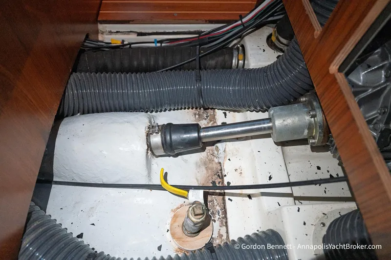 Slide: The Image of Engine compartment of 2004 Jeanneau Sun Odyssey 43 DS sailboat, showing mechanical components. - 63