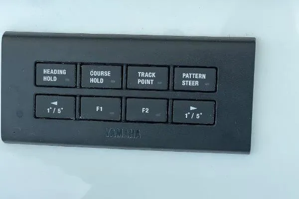 Slide: The Image of Control panel on a 2021 Regulator 34 boat with navigation buttons. - 18