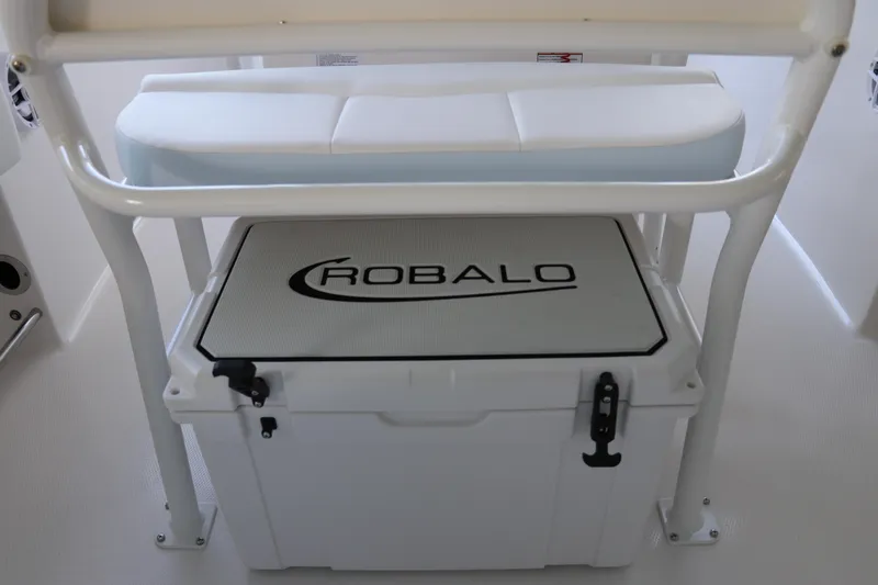 Slide: The Image of 2026 Robalo R202 Explorer boat interior with branded cooler under seat. - 17
