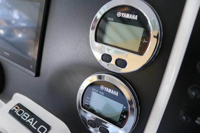 Slide: The Image of Dashboard of 2026 Robalo R202 Explorer with Yamaha gauges and Garmin display. - 22