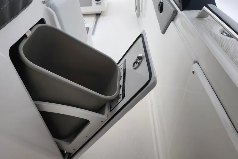 Slide: The Image of Built-in trash bin on 2026 Tiara Yachts 34 LS boat. - 22
