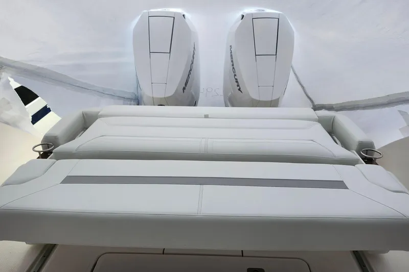 Slide: The Image of 2026 Tiara Yachts 34 LS with dual Mercury engines and luxurious seating. - 3