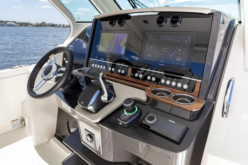 Slide: The Image of Manufacturer Provided Image: 2025 Tiara Yachts 34 LS helm with advanced navigation and control systems. - 45