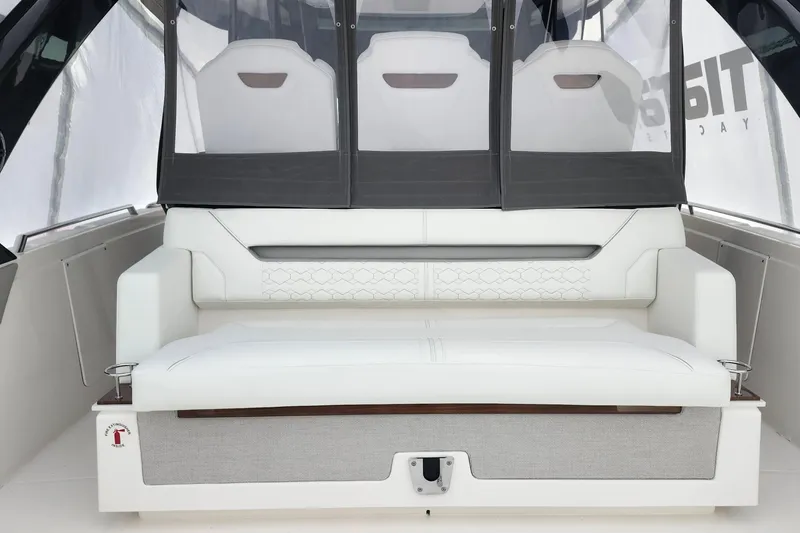 Slide: The Image of Luxurious seating area on 2026 Tiara Yachts 34 LS, featuring elegant white upholstery. - 9