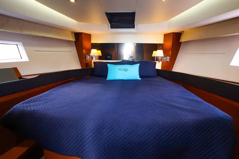 Slide: The Image of Luxurious cabin interior of 2015 Jeanneau NC 14 yacht with cozy bedding. - 18