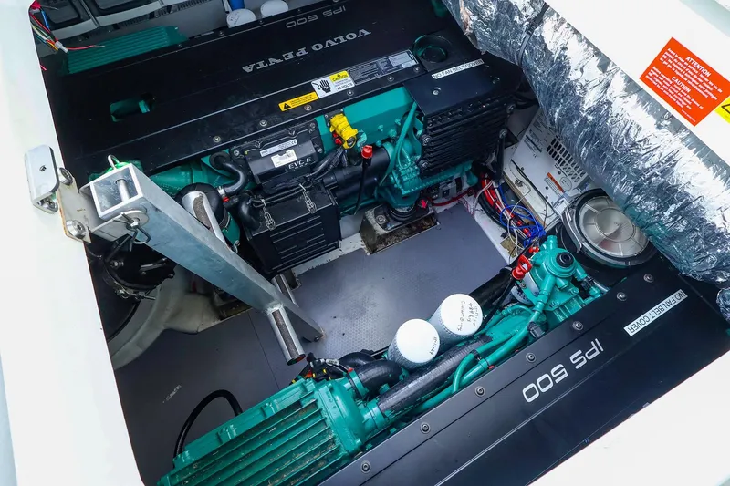 Slide: The Image of Engine compartment of a 2015 Jeanneau NC 14 with Volvo Penta IPS 500 engines. - 32