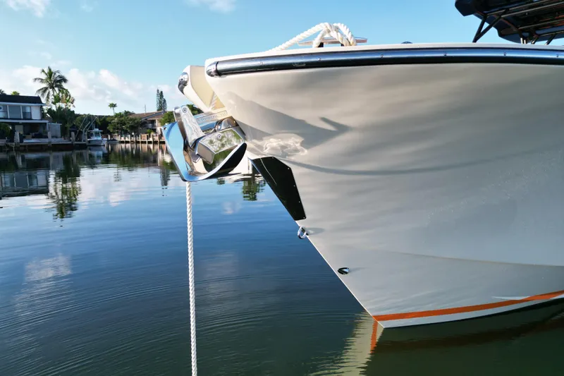 Slide: The Image of Lilybaeum Lipari 31 yacht docked in a serene marina, 2026 model. - 11