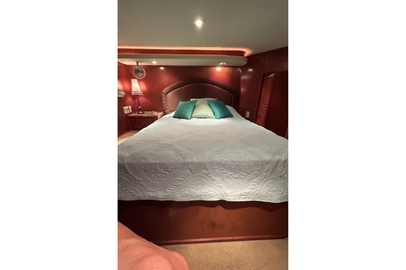 Slide: The Image of Luxurious bedroom interior in 2007 Sharpe 18 x 90 houseboat with elegant bedding. - 13