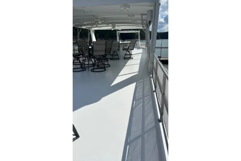 Slide: The Image of Upper deck of 2007 Sharpe 18 x 90 houseboat with seating and railing. - 3