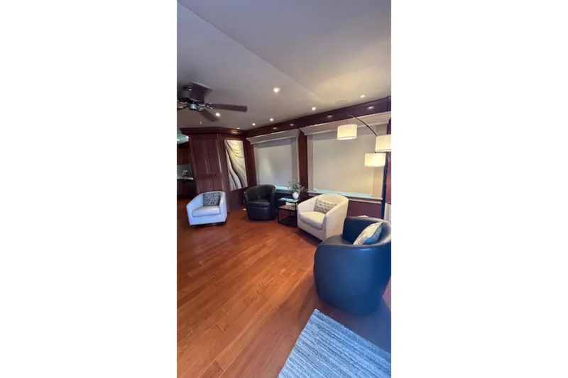 Slide: The Image of Luxurious 2007 Sharpe 18 x 90 houseboat interior with elegant seating and wooden flooring. - 9