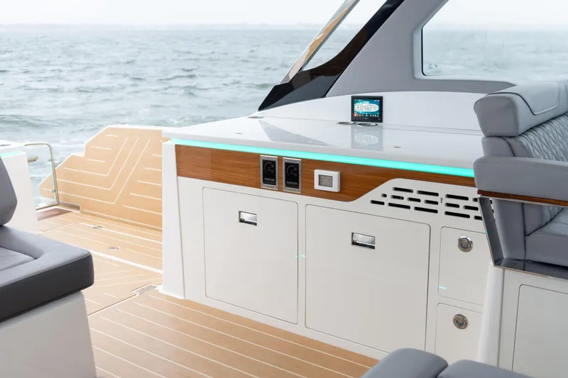 Slide: The Image of Luxurious 2026 Regal LX43 yacht interior with modern seating and sleek design. - 17