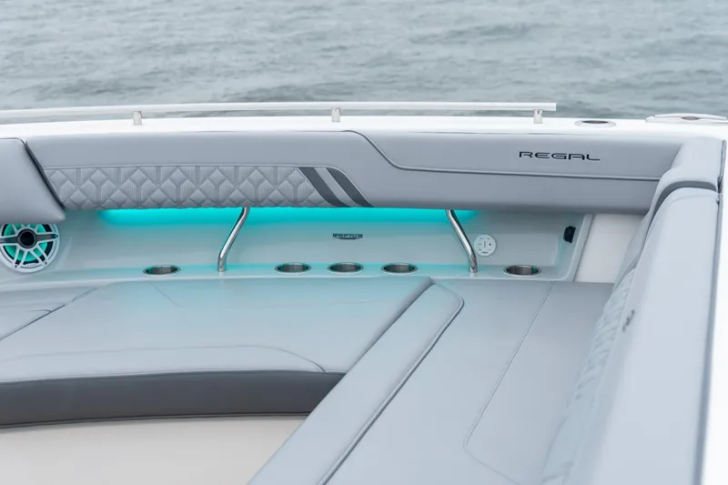 Slide: The Image of Luxurious interior of 2026 Regal LX43 boat with elegant seating and ambient lighting. - 43
